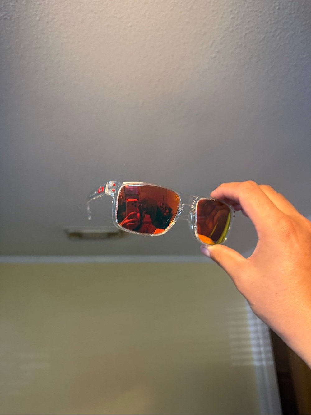 Clear Frame Sunglasses with Red-Orange Mirrored Lenses Oakleys